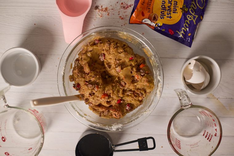 Browned butter cookie dough mixed with pieces of Cadbury chocolate eggs.