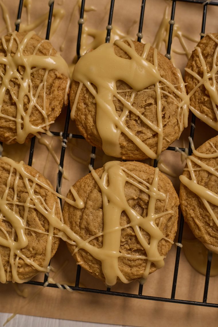 maple brown sugar cookies setting on a cooling rack.