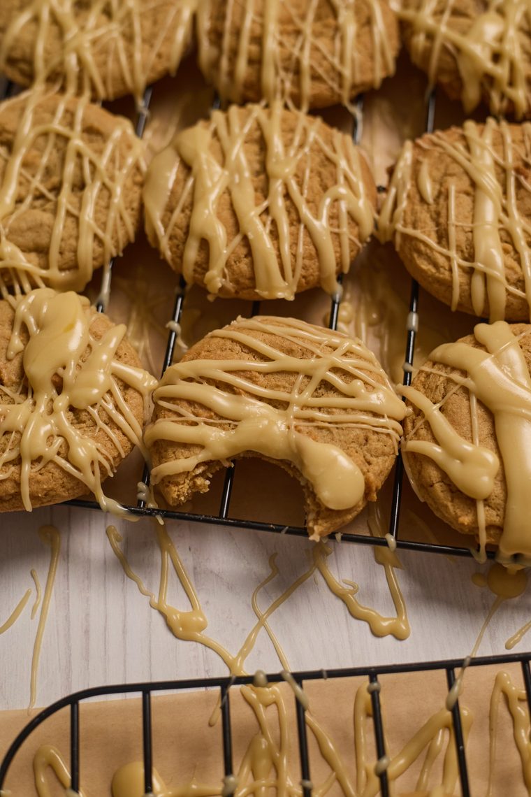 maple brown sugar cookies setting on a cooling rack.