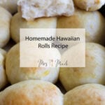 Check out these golden, fluffy homemade Hawaiian rolls! One’s pulled open so you can see the super soft inside. Text says “Homemade Hawaiian Rolls Recipe Mrs Madi.” Perfect if you’re craving some fresh, soft goodness right from your own oven!.