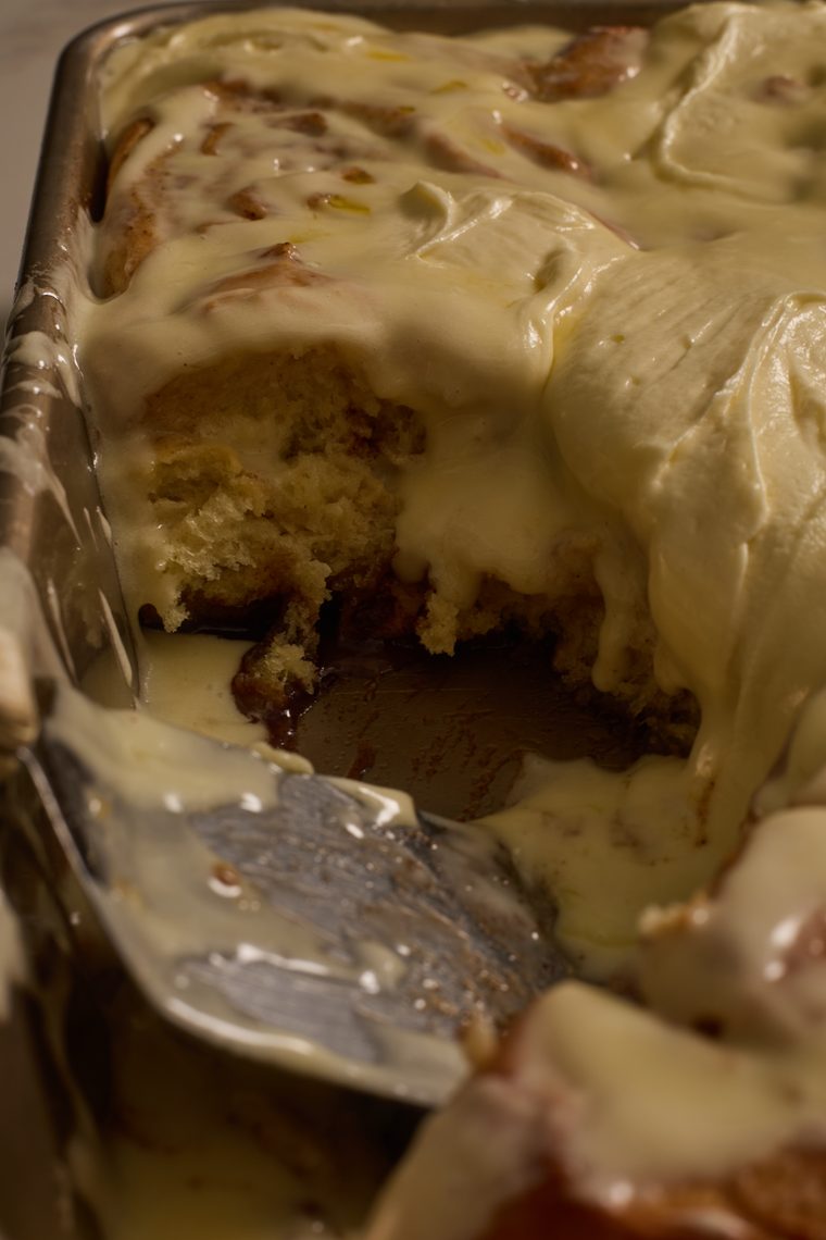 up close on a pan full of apple pie cinnamon rolls 