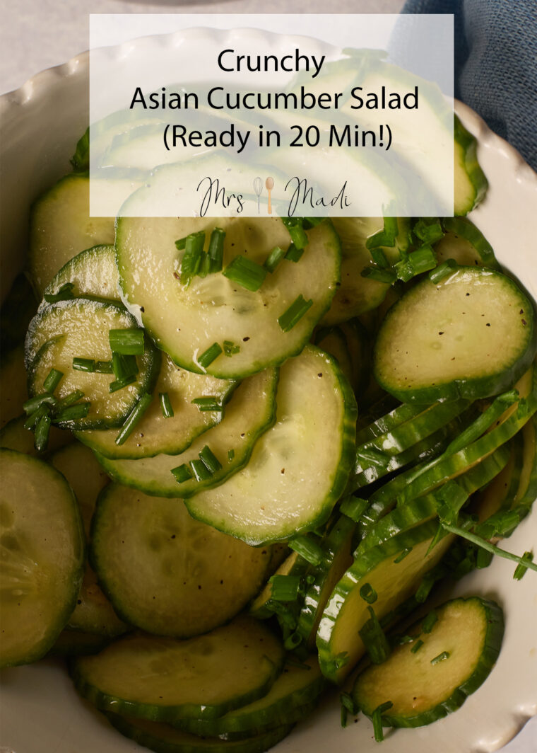 A bowl of crisp Asian cucumber salad with chives on top, plus text that says "Asian Cucumber Salad (Ready in 20 Min!).